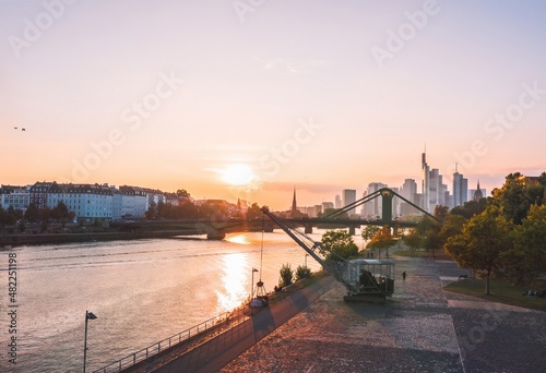 Obraz na płótnie Aerial cityscape of Frankfurt am Main (Germany) from Wesseler Werft dock. Sunlit skyscrapers at sunset w salonie