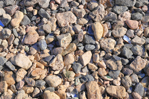 Sea pebbles, stones polished by water, background, texture,