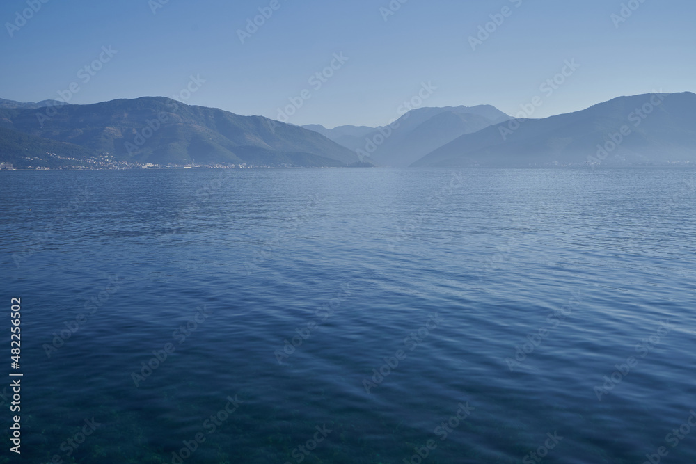 Morning seascape with mountains in adriatic sea in Montenegro Morning seascape with mountains in adriatic sea in Montenegro