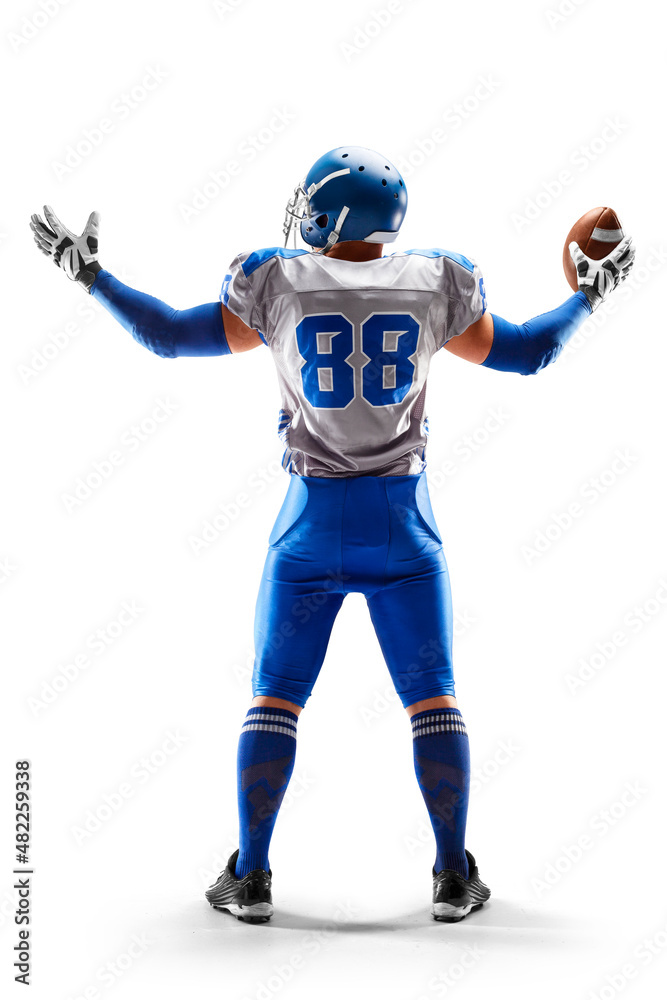 American Football player holding the ball in his hand. Joy in football. Sport emotions. Sport victory. Back view. Isolated on white background