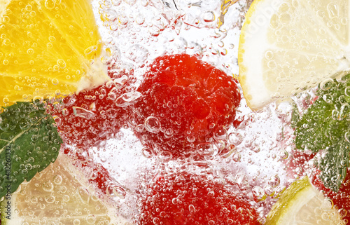 Fresh Home Made Fruit Lemonade with Sparkling Water and Ice Cubes