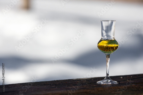 Flavored Grappa (Schnapps) glass in Cortina d'Ampezzo, Dolomites, Italy