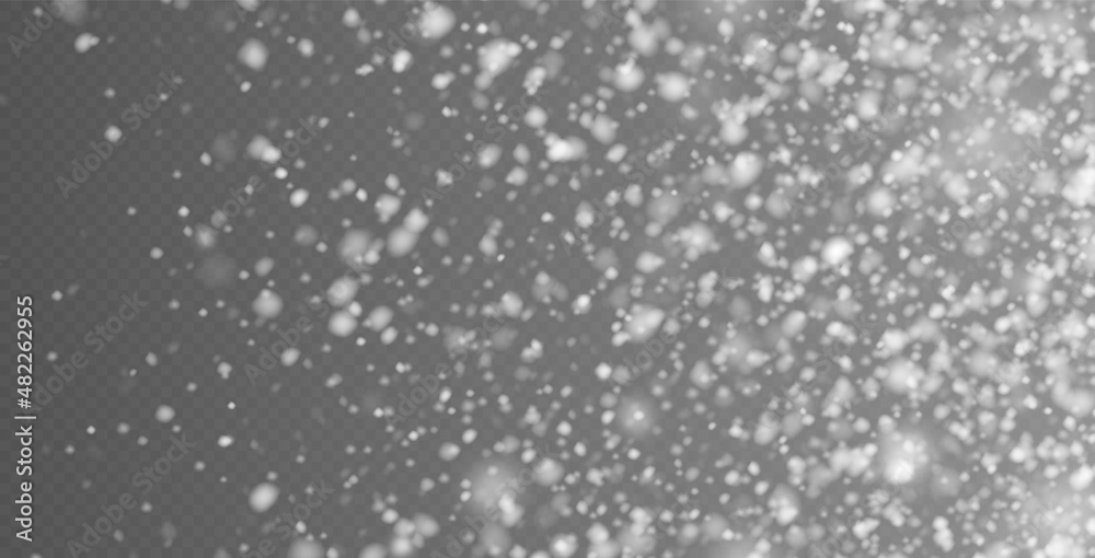Falling snow in motion, white blurred snowflakes flying in the air.
