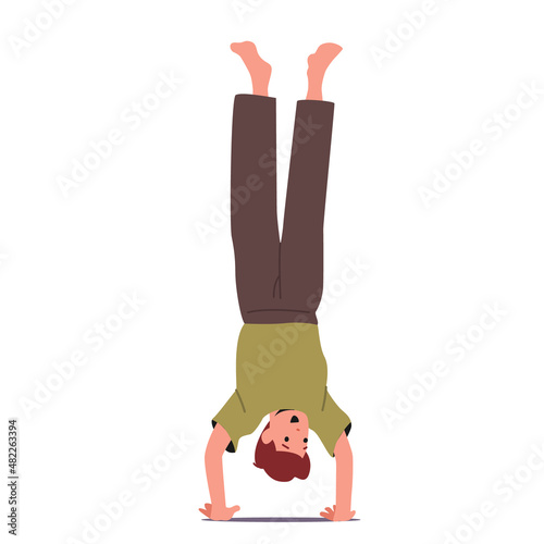 Boy Standing Upside Down Isolated on White Background. Little Child Fooling, Fun and Rejoice. Preteen Kid Handstand