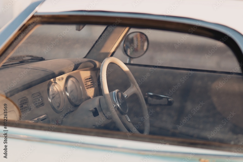 car window and steering wheel