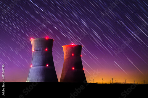 Astophotography Image of Nuclear Power Plant with Colourful Sunset and Star Trail at Night