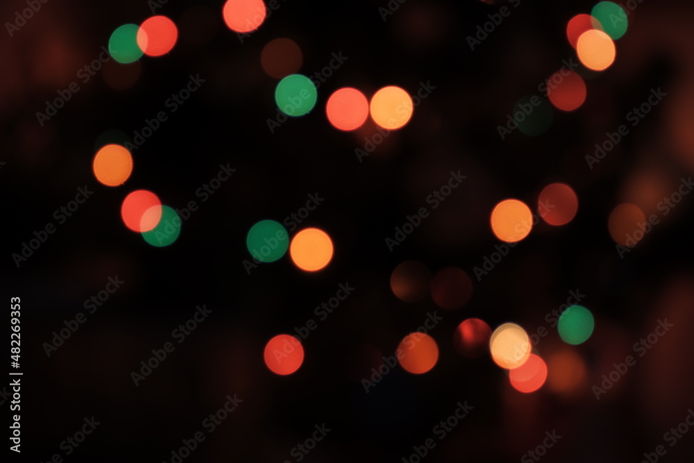 Defocused background. Bokeh abstract texture. Colorful. Circular points. Blurred bright light. 