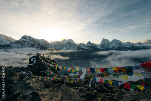 Buddhist prayer flags in the Himalaya mountains, gokio ri, in Nepal photo