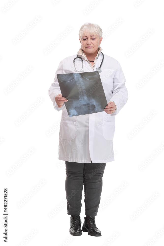 Medical doctor analysing x-ray image looking at camera and smiling Medical doctor analysing x-ray image looking at camera and smiling