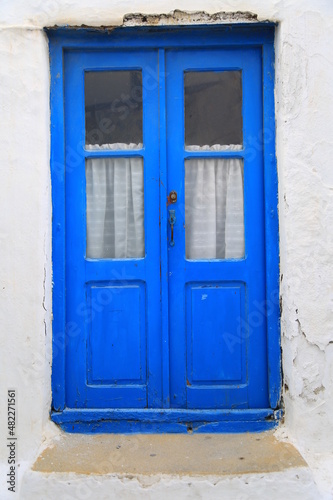 santorini  island  greece  greek  door  building  street  window  old  home  wall  chair  stone  europe  travel  town  sea  village  table  wood  entrance  sky  white  city  architecture  house  blue 
