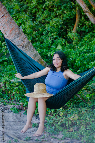 woman relaxing on a hammock