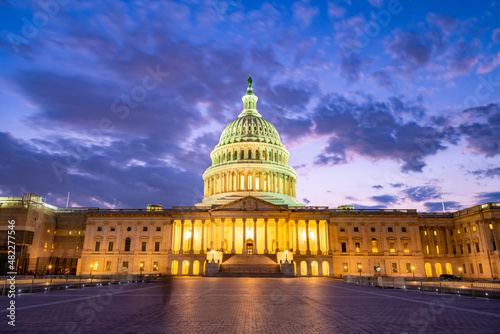 The United States Capitol at night, often called the Capitol Building, is the home of the United States Congress and the legislative branch of the U.S. federal government. Washington, United States. photo