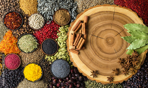 Fototapeta Naklejka Na Ścianę i Meble -  Collection spices for cooking delicious food. Colorful seasoning background, top view.