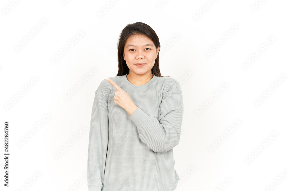 Pointing Product on the Side Of Beautiful Asian Woman Isolated On White Background Pointing Product on the Side Of Beautiful Asian Woman Isolated On White Background
