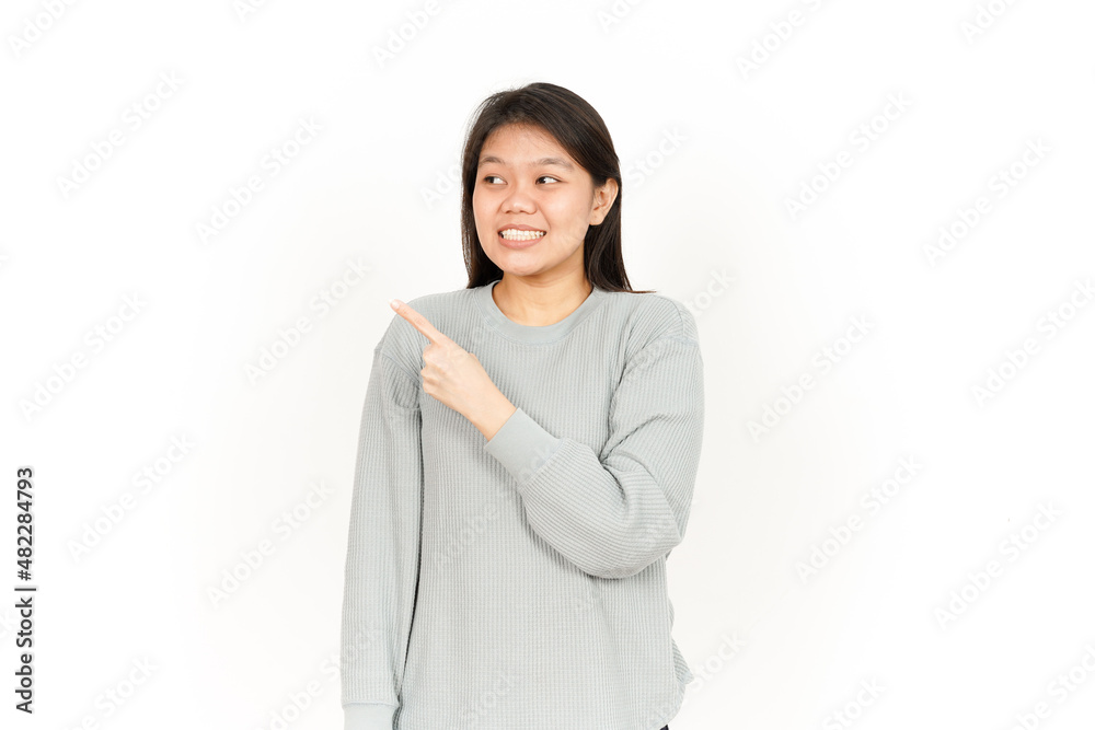 Pointing Product on the Side Of Beautiful Asian Woman Isolated On White Background Pointing Product on the Side Of Beautiful Asian Woman Isolated On White Background