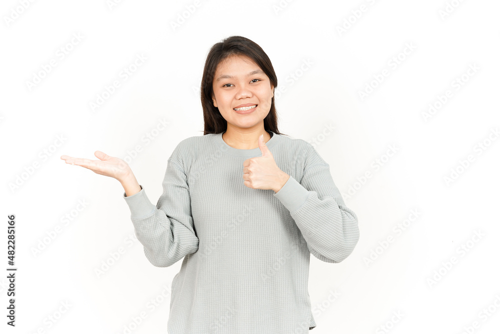 Showing Product on Open Palm Of Beautiful Asian Woman Isolated On White Background Showing Product on Open Palm Of Beautiful Asian Woman Isolated On White Background