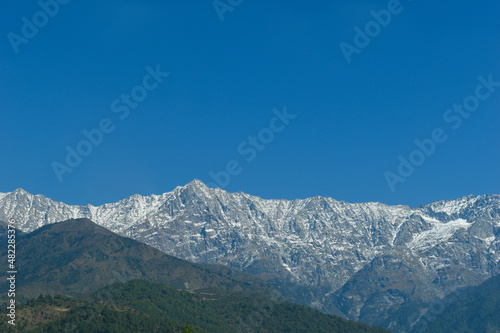Beautiful majestic dhauladhar range of himalayas captured in dharamshala with telephoto lens
