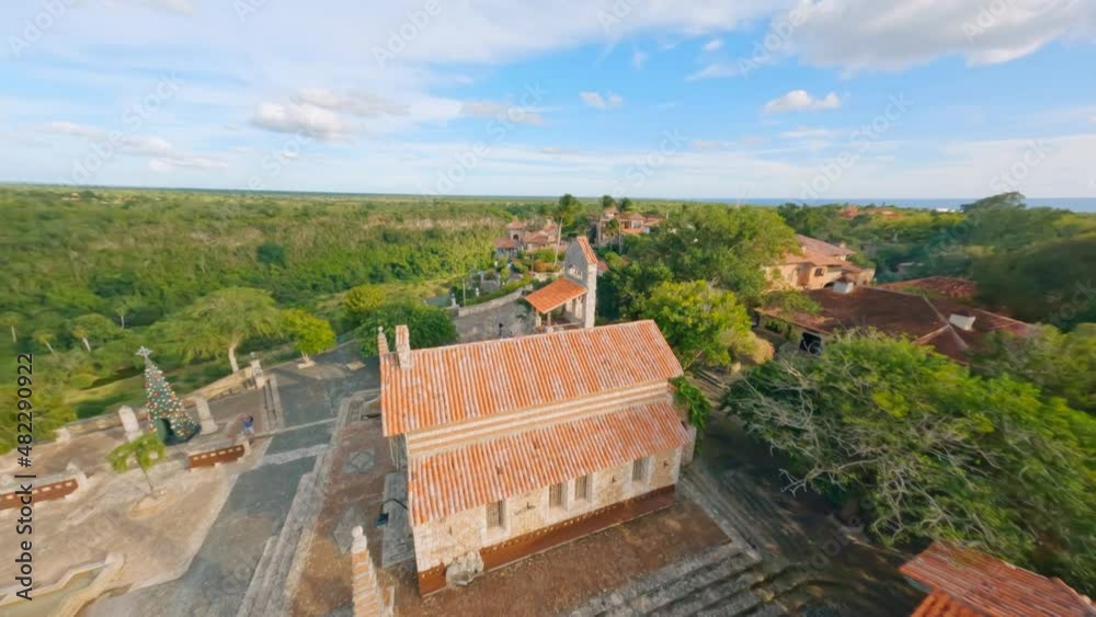 Smooth low-altitude flight over the medieval town of Altos de Chavon Smooth low-altitude flight over the medieval town of Altos de Chavon