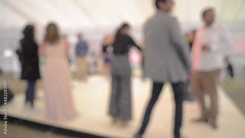 Soft focus shot of young Latin people dancing at celebration fiesta party. Soft focus shot of young Latin people dancing at celebration fiesta party.