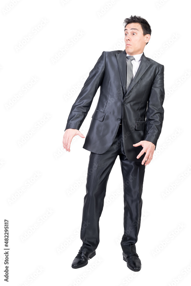Astonished young businessman looking away in white studio Astonished young businessman looking away in white studio