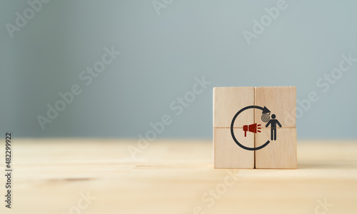 Retargeting or remarketing concept.  Digital marketing. Online strategy in social media. Visitor management  and method for marketing campaign and promotion. The wooden cubes with retargeting icon. photo
