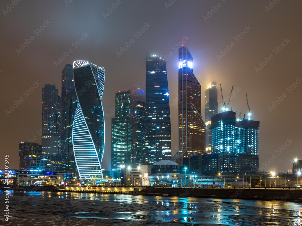 Naklejka premium Moscow city at winter night. Modern skyscrapers in Moscow-city downtown. Moscow, Russia