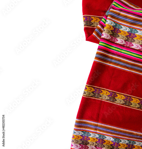 Peru. Colorful traditional Inca Lliclla blanket on a white background