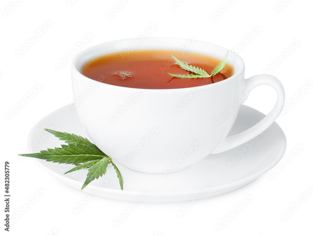 herbal tea with cannabis leaves in a white cup on an isolated white background herbal tea with cannabis leaves in a white cup on an isolated white background