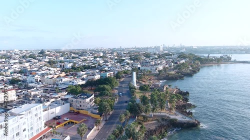 Coast along Malecon in Santo Domingo. Aerial drone forward photo