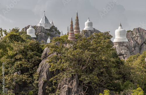 Lampang, Thailand - Sep 03, 2020 : Pagoda on top of the cliff high mountain at Chaloem Phrakiat Phrachomklao Rachanuson temple (Wat Phrabat Pu Pha Daeng) Chae-Hom District, Lampang province, Unseen an photo