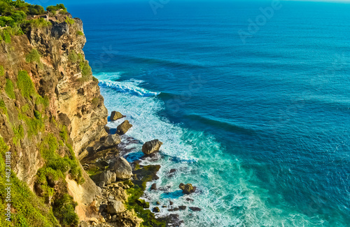 View of Uluwatu cliff and blue sea in Bali, Indonesia