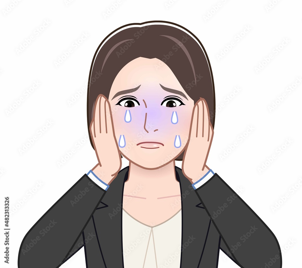 頭を抱えてなく人 頭を抱えてなく人