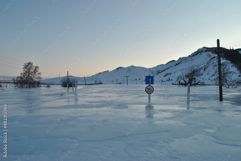 Baikal. Baikal ice. Winter road on Lake Baikal. Siberia.