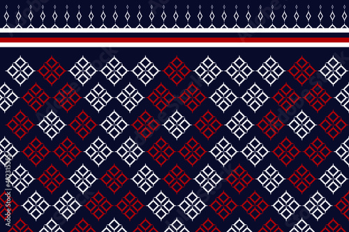 frabic pattern on dark blue background with red and white and flower. Traditional Ethnic design for clothing and textile background, carpet or wallpaper