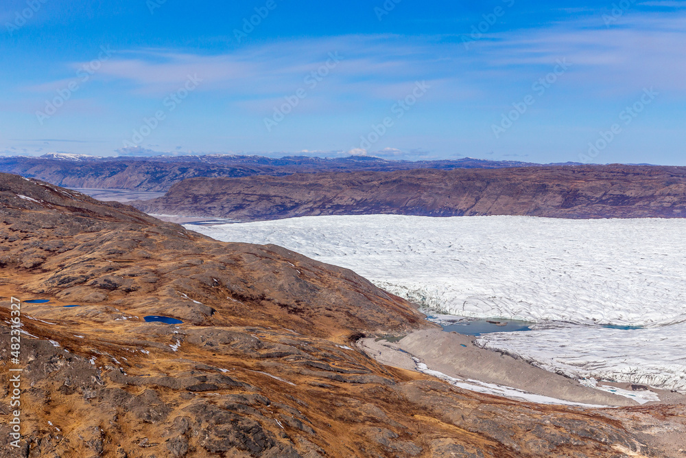 Greenlandic tundra landscape with  ice cap melting, aerial view, near Kangerlussuaq, Greenland