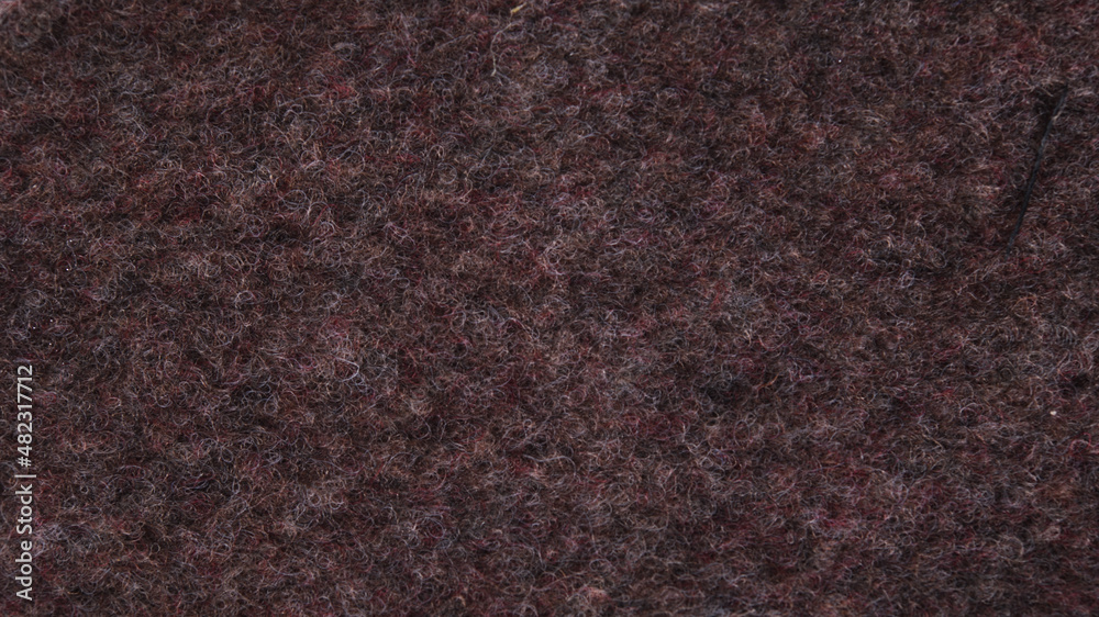 Fototapeta premium The texture of the felt is brown. Abstract background and texture for design.