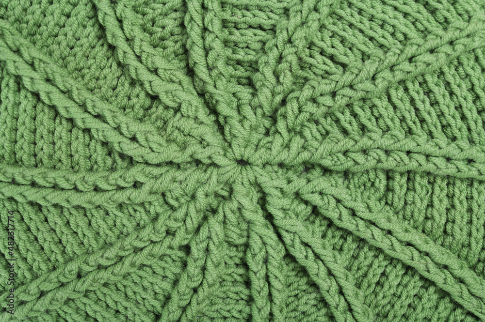 Knitted spiral double crochet in circle cap background 
