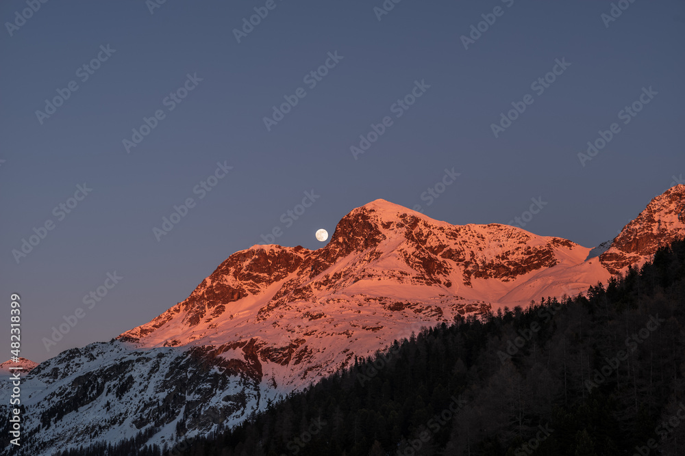 moonrise over the swiss alps