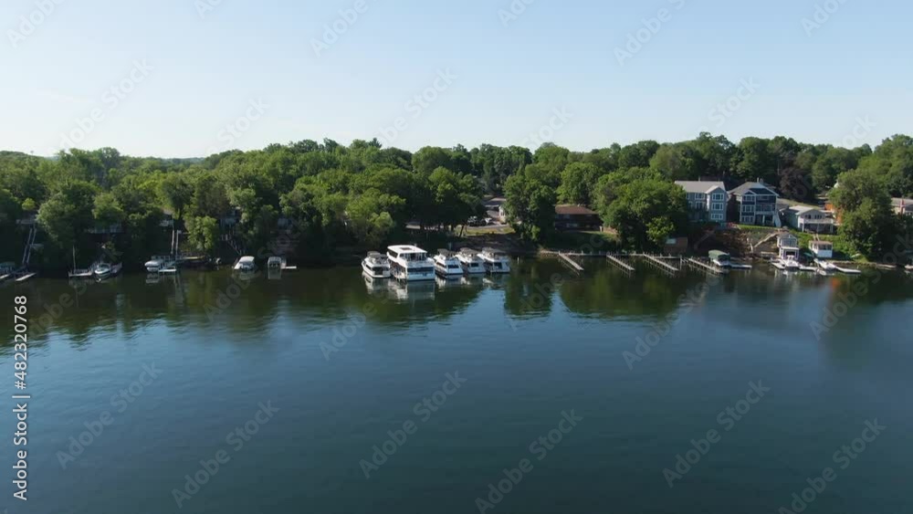 Push In Shot of Boats Parked in the Harbor on a Calm Lake, Aerial 4K Drone Push In Shot of Boats Parked in the Harbor on a Calm Lake, Aerial 4K Drone