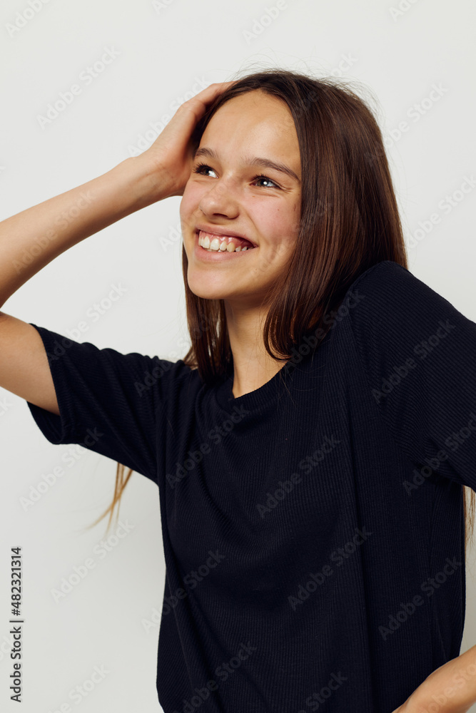 beautiful girl in a black t-shirt hand gesture fun isolated background beautiful girl in a black t-shirt hand gesture fun isolated background