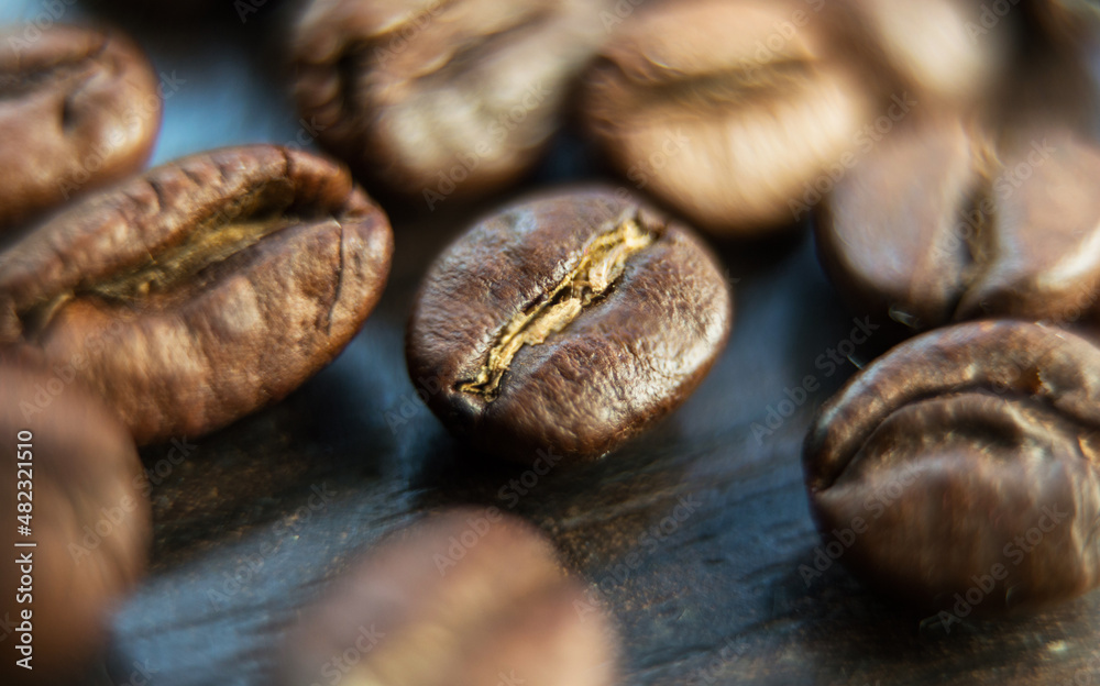 Close-up macro photography of coffee beans. For coffee shop banners and posters. Layout for the site and the design of story posts in social networks About coffee. Close-up macro photography of coffee beans. For coffee shop banners and posters. Layout for the site and the design of story posts in social networks About coffee.