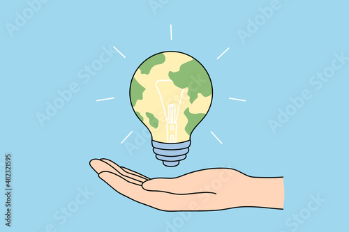 The concept of a global idea. A glowing light bulb with a world map. The concept of a global idea