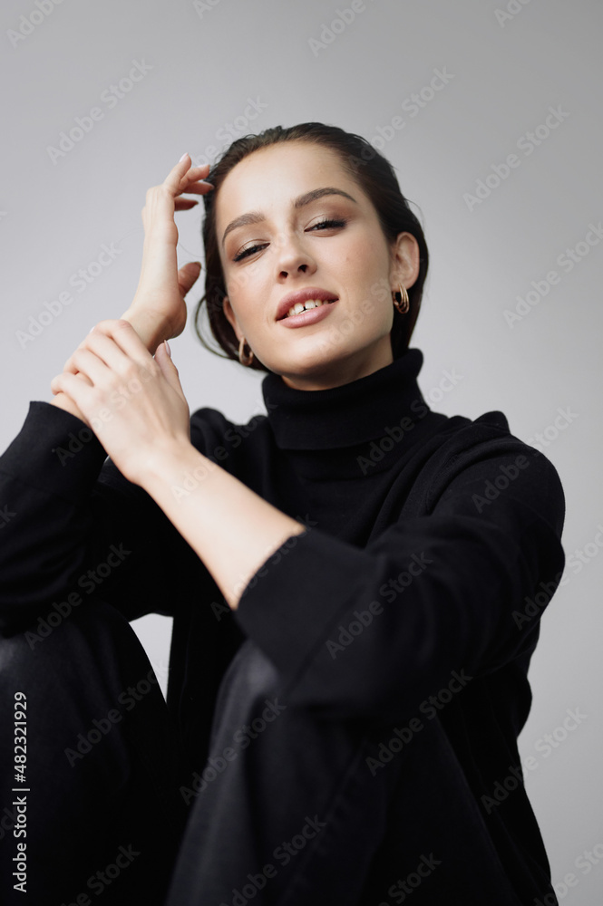 Good series of photos of young pretty woman. Studio. European type, big lips, awesome eyes, slim body. White background. Black clothes. Emotional. Minimalism. Stylish. Fashionable and modern lifestyle Good series of photos of young pretty woman. Studio. European type, big lips, awesome eyes, slim body. White background. Black clothes. Emotional. Minimalism. Stylish. Fashionable and modern lifestyle