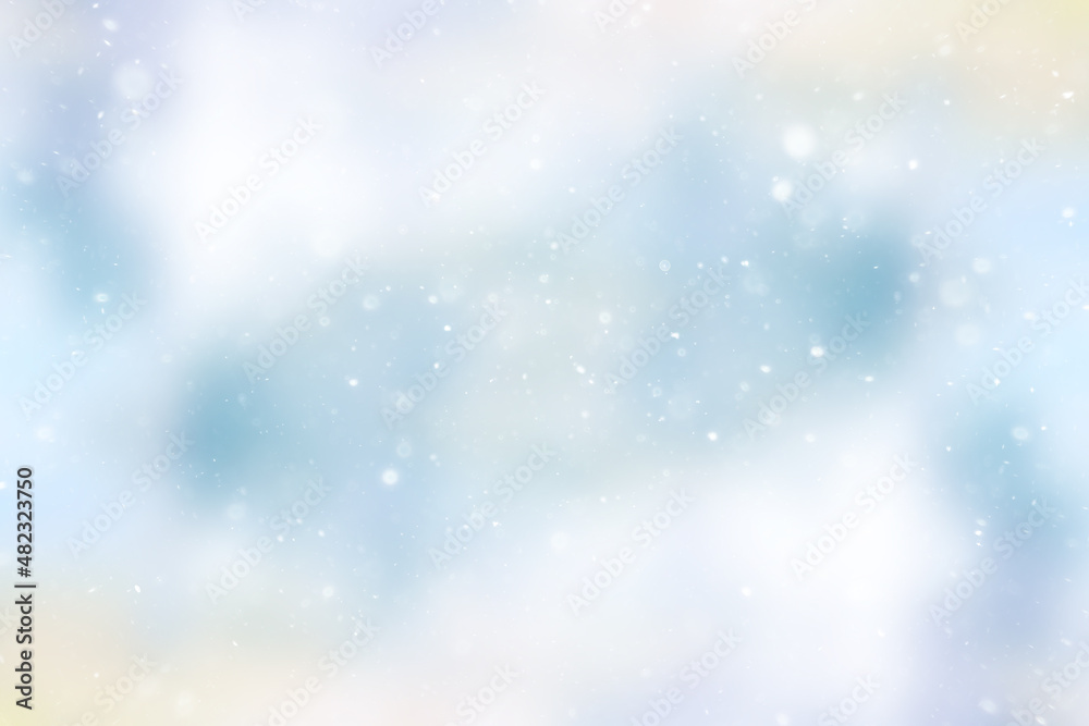 blurred snow / winter abstract background, snowflakes on abstract blurred glowing leaf background