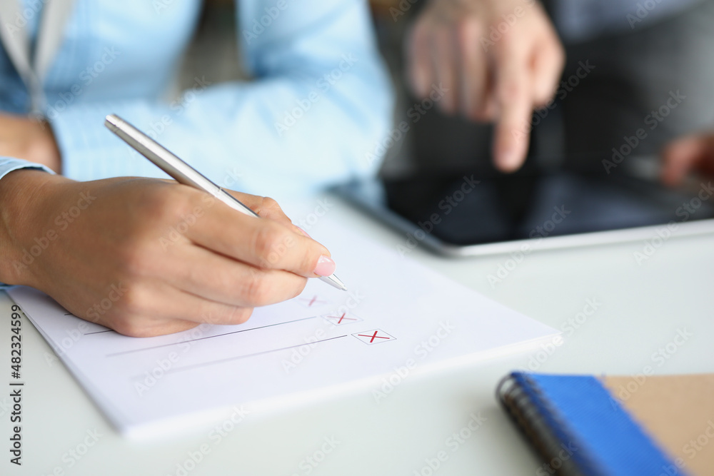 Businessmen make up a strategy, write down a list of options