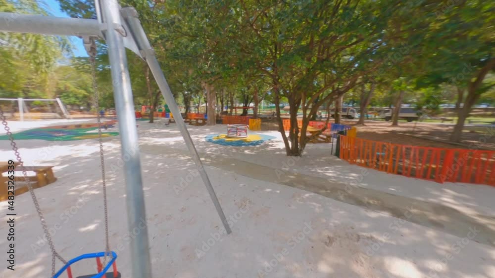Aerial fpv drone flying in deserted children playground, Mirador Sur in Santo Domingo. Dominican Republic Aerial fpv drone flying in deserted children playground, Mirador Sur in Santo Domingo. Dominican Republic
