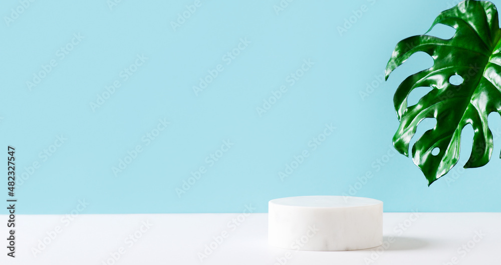 Blue cosmetic background with white stone empty space Blue cosmetic background with white stone empty space