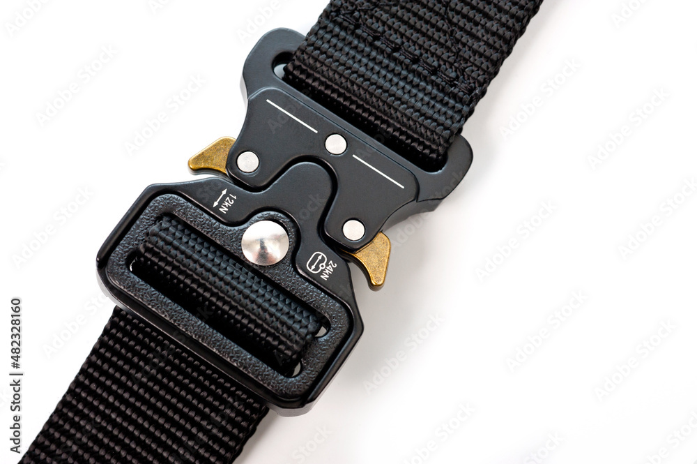 Black belt for clothes and trousers with a metal automatic fastener. Black belt for clothes and trousers with a metal automatic fastener.