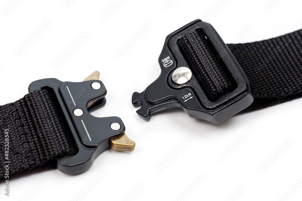 Black belt for clothes and trousers with a metal automatic fastener. Black belt for clothes and trousers with a metal automatic fastener.