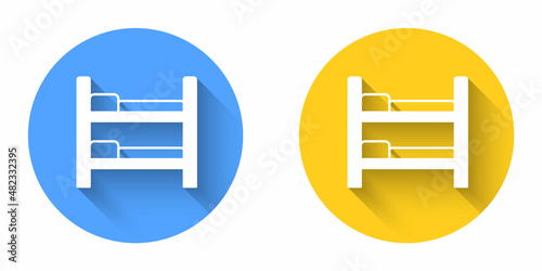 White Bunk bed icon isolated with long shadow background. Circle button. Vector